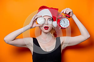 Woman using eye patch for her eyes in Santa Claus hat