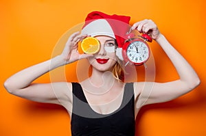 Woman using eye patch for her eyes in Santa Claus hat