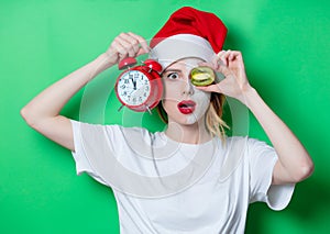 Woman using eye patch for her eyes in Santa Claus hat