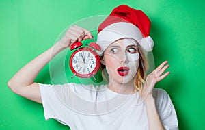 Woman using eye patch for her eyes in Santa Claus hat