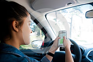 Woman using gps navigation system.