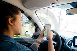 Woman using gps navigation system.