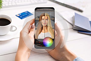 Woman Using Hair Color Simulation App On Mobile Phone