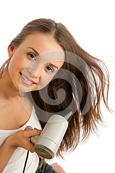 Woman using hairdryer