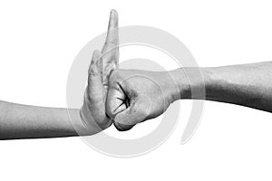 Woman using hand palm to stop man`s punch from attack isolated on white background. stop violence against women campaign photo