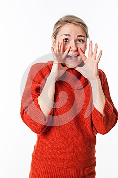 Woman using hands to reveal a surprising secret loud