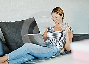 woman laptop sofa computer home technology young internet communication girl sitting