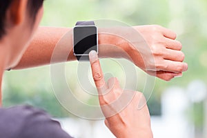 Woman using her smart watch