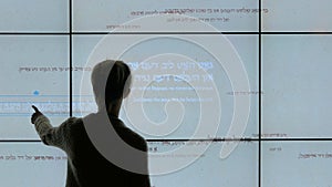 Woman using interactive touchscreen display