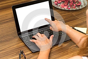 Woman Using Laptop with Blank Screen