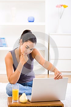 Woman using laptop computer