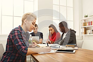 Woman using laptop at modern office