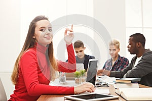 Woman using laptop at modern office