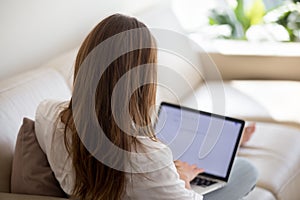 Woman using laptop for typing email letter or writing blog