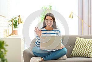 Woman using laptop for video chat