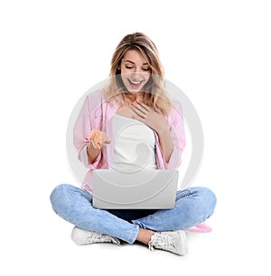 Woman using laptop for video chat on white