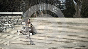 Woman Using Laptop While Working Outdoors