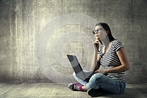 Woman Using Laptop, Young Girl in Glasses Thinking on Notebook