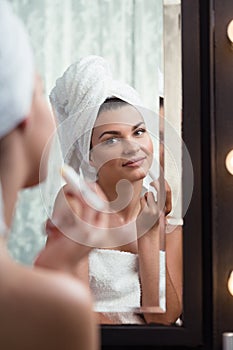 Woman using lip balm