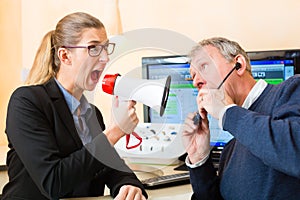 Woman using a loudhailer in hearing test photo