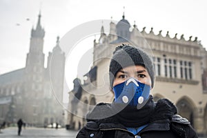 Woman using a mask, protecting herself from smog