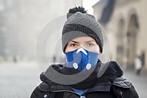 Woman using a mask, protecting herself from smog