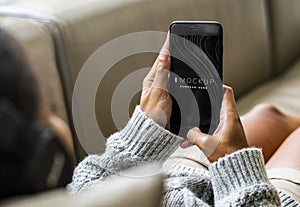 Woman using a mobile phone mockup