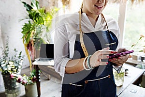 Woman using mobile phone searching for information