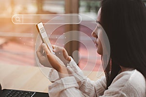 Woman using on mobile phone to find out online what interests them Searching information data on internet networking
