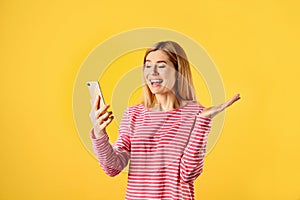 Woman using mobile phone for video chat