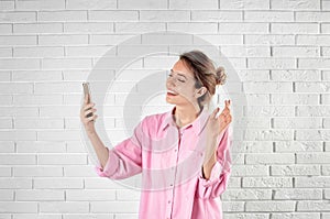 Woman using mobile phone for video chat