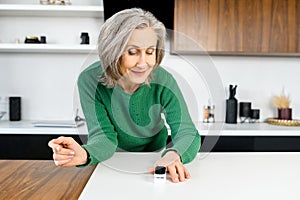 Woman using oximeter for measures the oxygen saturation