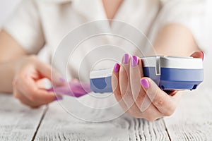 Woman using payment terminal