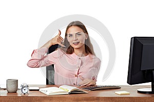 woman using PC computer and doing talking on the telephone gesture.