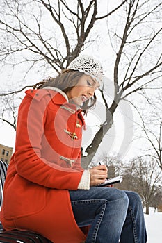 Woman using PDA.