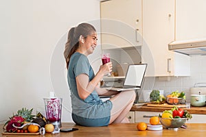 Woman using personal laptop with blank empty screen with copy space, looking for new healthy recipe online, mock up