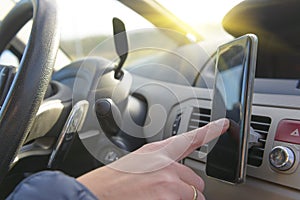 Woman using phone while driving the car