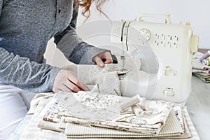 Woman using sewing machine