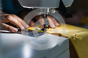 Woman using sewing machine