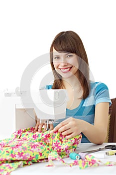 Woman using sewing machine