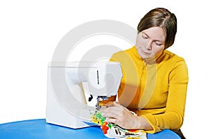 Woman using a sewing machine