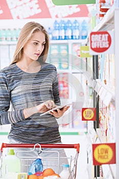 Woman using shopping apps on the tablet