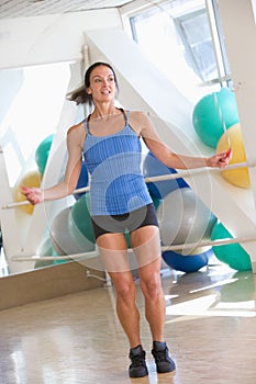 Woman Using Skipping Rope At Gym