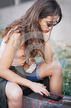Woman using smart phone connect communication. Emotional isolation, technology depresion photo
