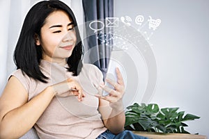 Woman using smart phone ,social media with technology icon of shopping online, chatting concept