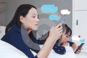 Woman using smartphone with chatbox message, chatting communication connect on mobile phone. photo