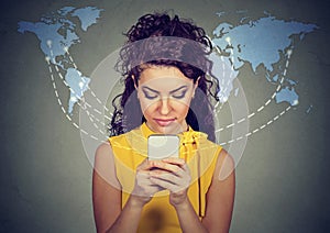 Woman using smartphone connected browsing internet worldwide