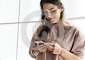 Woman using a smartphone social media concept