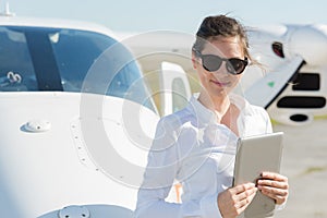 Woman using tablet in airport