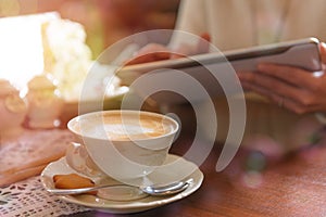 Woman using tablet in the cafe